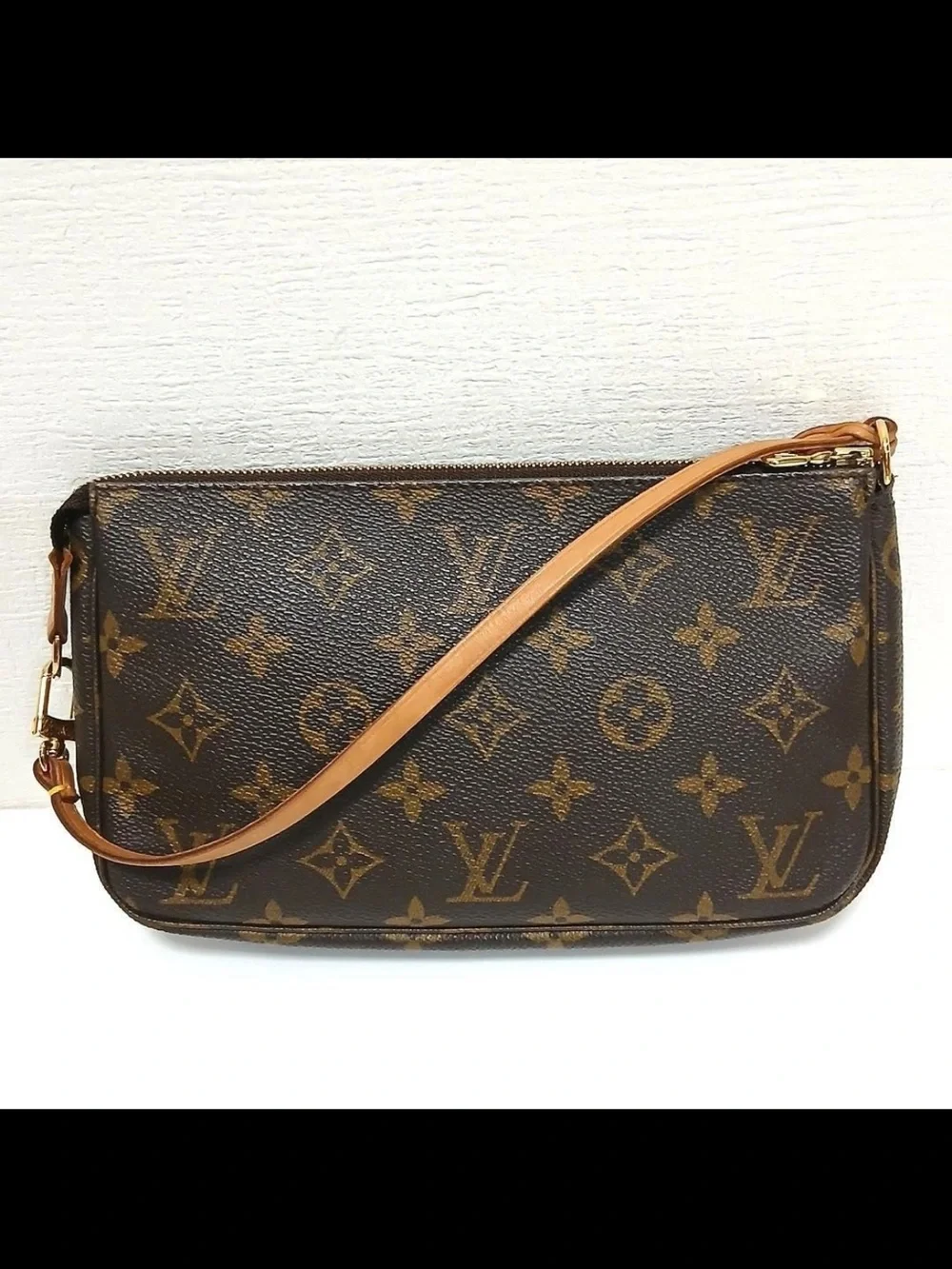 Louis Vuitton Monogram Canvas Mini Wristlet in Brown
